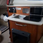 Bayliner 245 - Galley with electric hob, fridge and sink unit